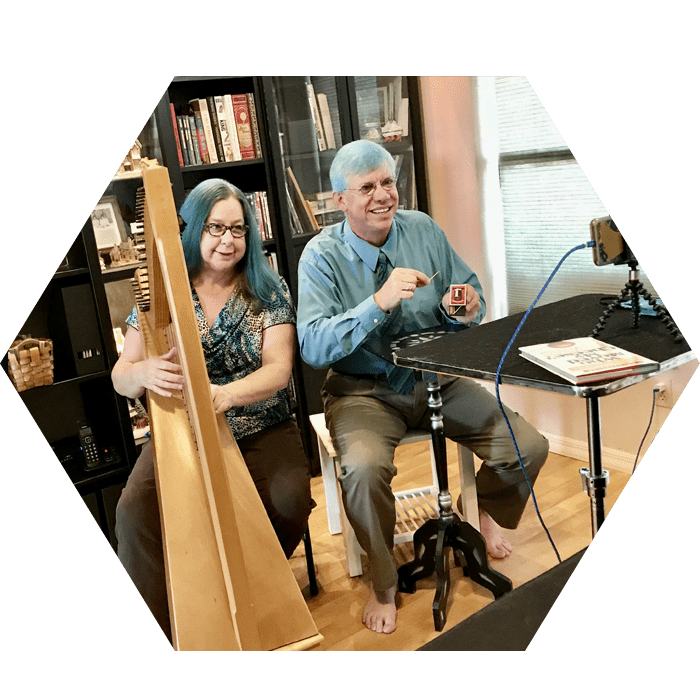 James Songster and a Woman Holding an Instrument James Songster and a Woman Holding an Instrument